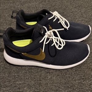 Nike Black and Gold Athletic Shoes